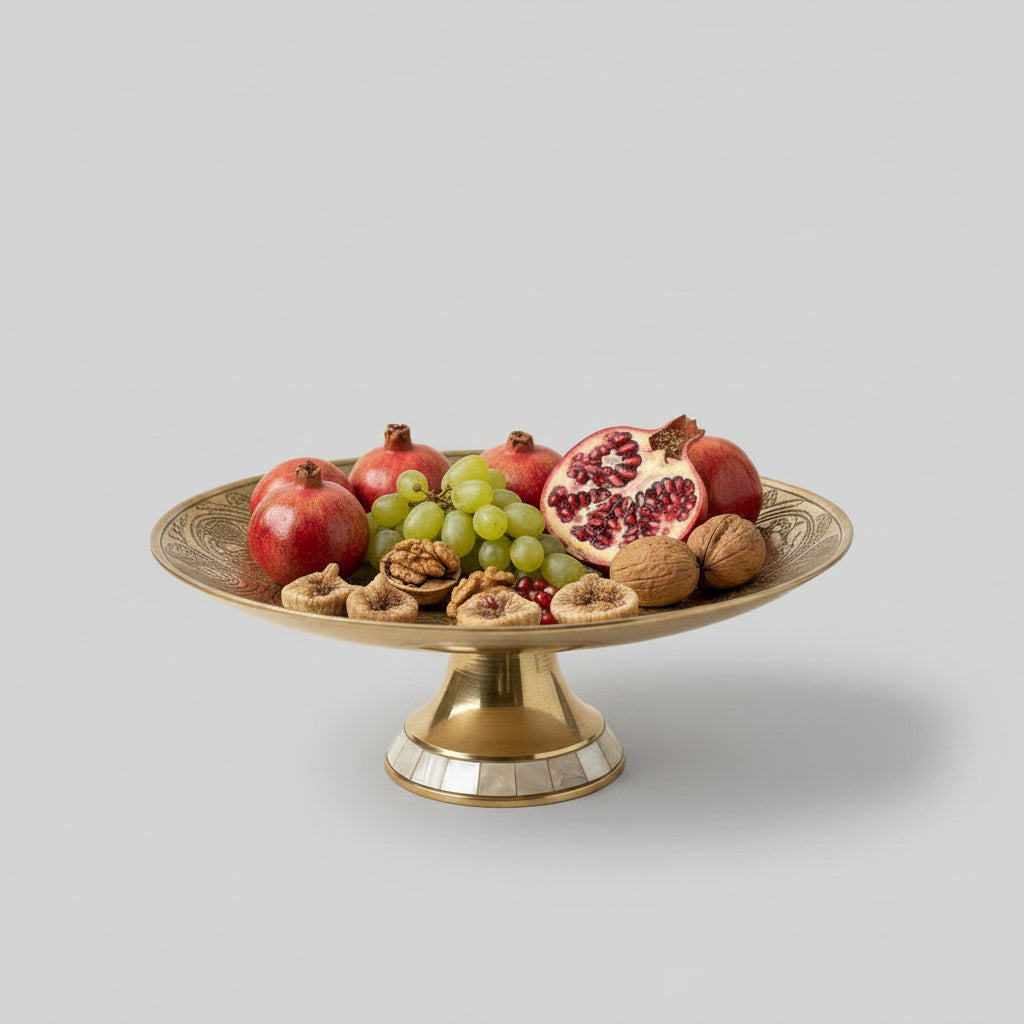 Brass oval fruit bowl with sculpted peacock handle and mother of pearl rim — heirloom Indian centerpiece