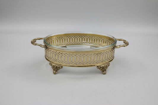 Brass oval casserole with hand-pierced jali lattice work and clear glass insert — heritage Indian serveware